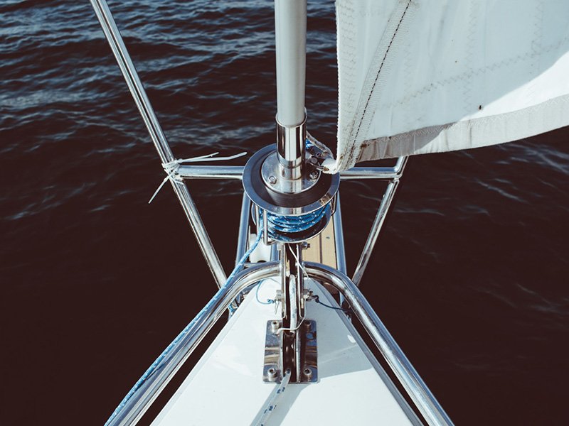 Sailboat rigging above open water